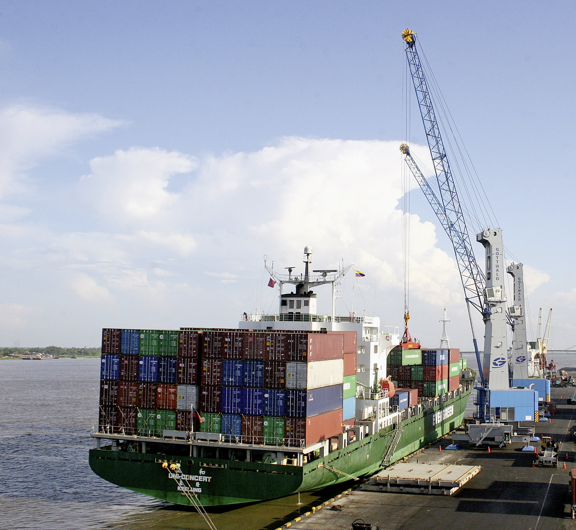 Two Gottwald G HMK 6407 Mobile Harbour Cranes handling containers. A similar machine  is being delivered to Belfast.